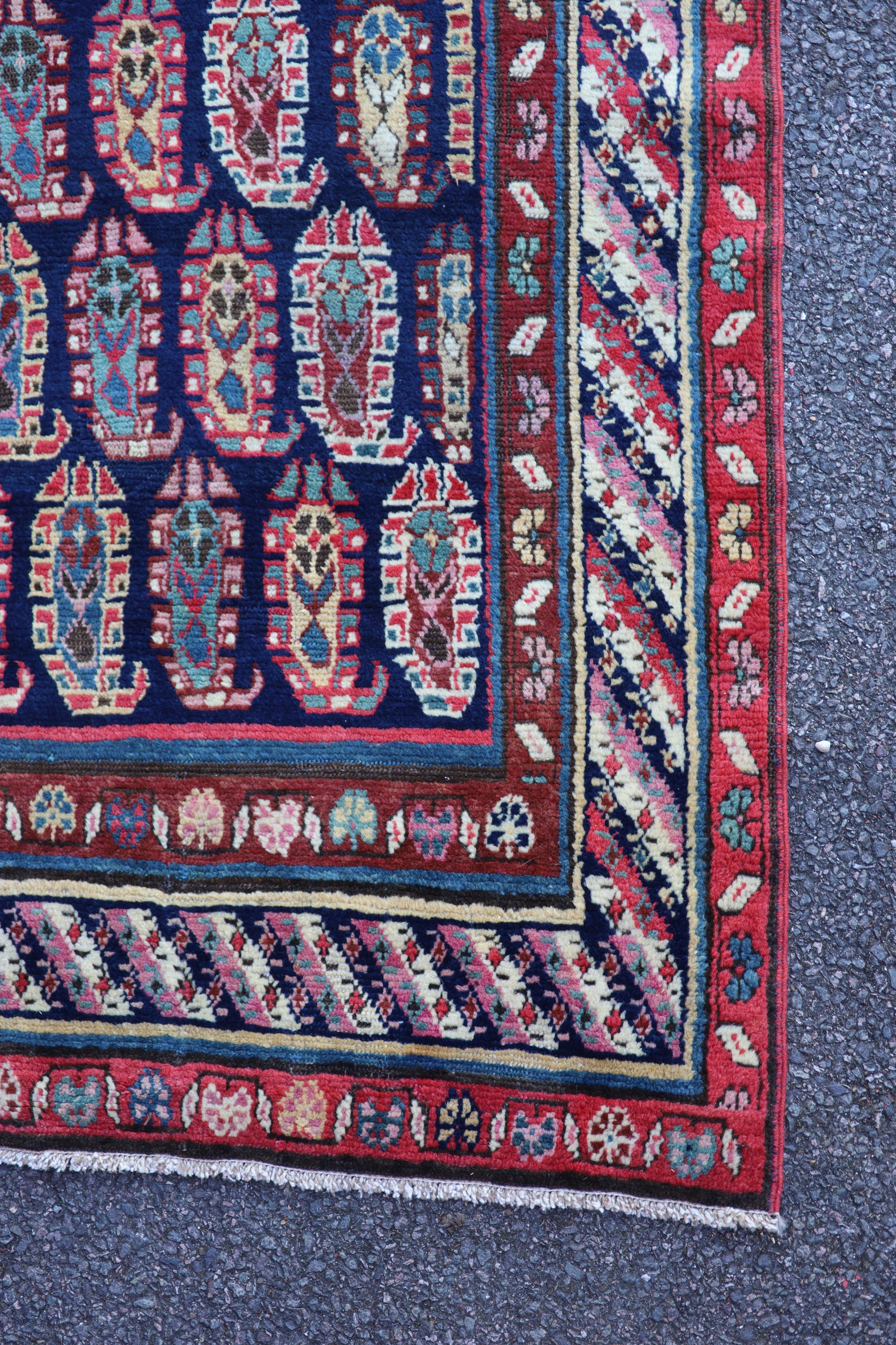 An antique Karabagh blue ground runner, late 19th century 355 x 106